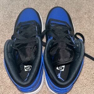 Black and blue Jordans